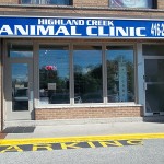 Highland Creek Animal Clinic exterior with blue and white sign